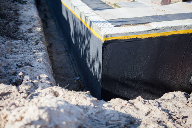 Professional Waterproofing technician working in Dunkirk, IN